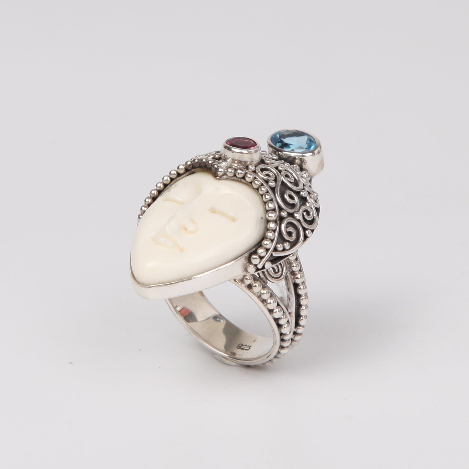 Buffalo Bone( Moon face) Sterling Silver Ring with Blue Topaz and Garnet