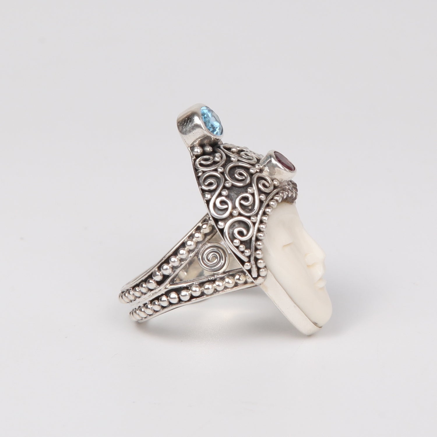 Buffalo Bone( Moon face) Sterling Silver Ring with Blue Topaz and Garnet