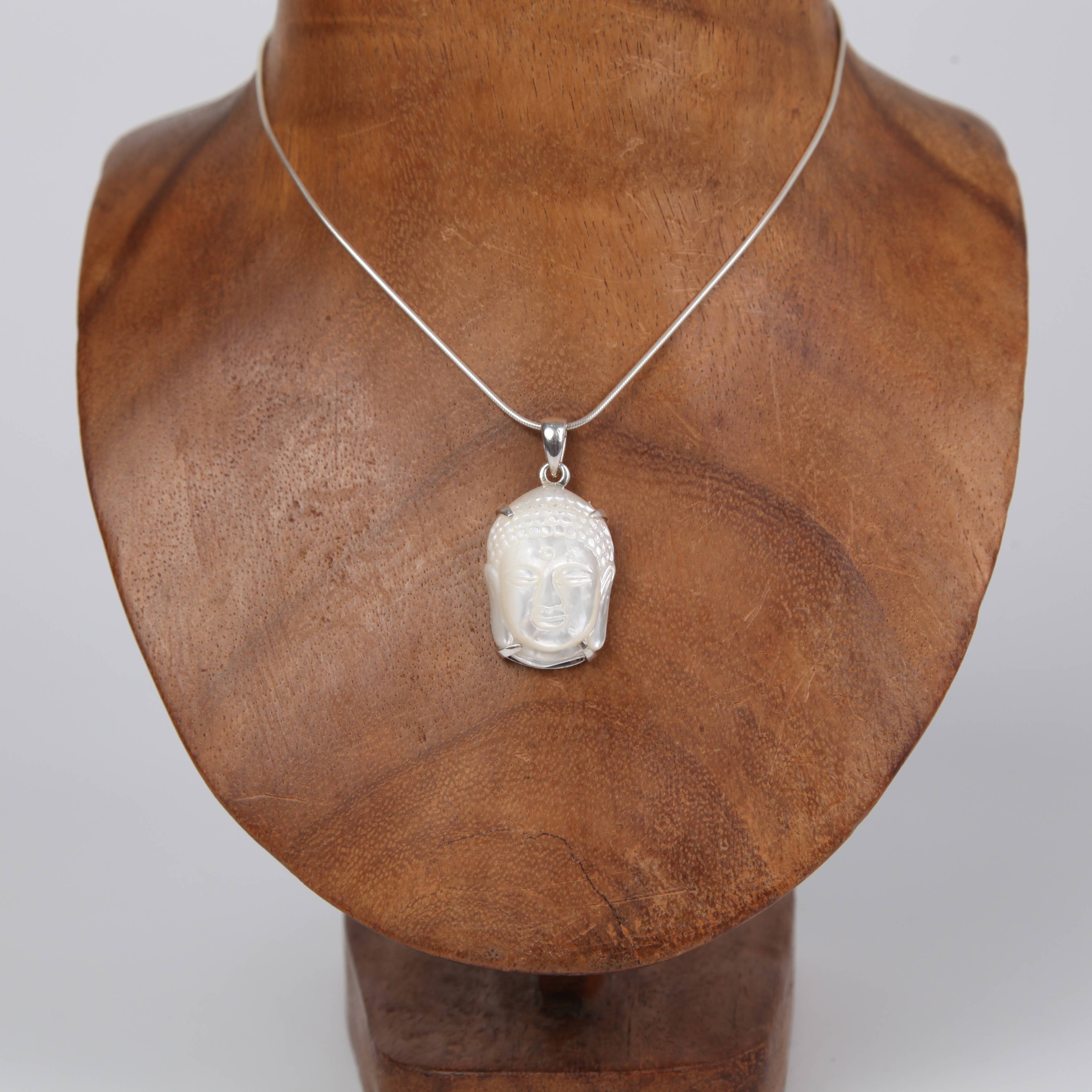Carved Mother of Pearl Hand Pendant with Silver Bail