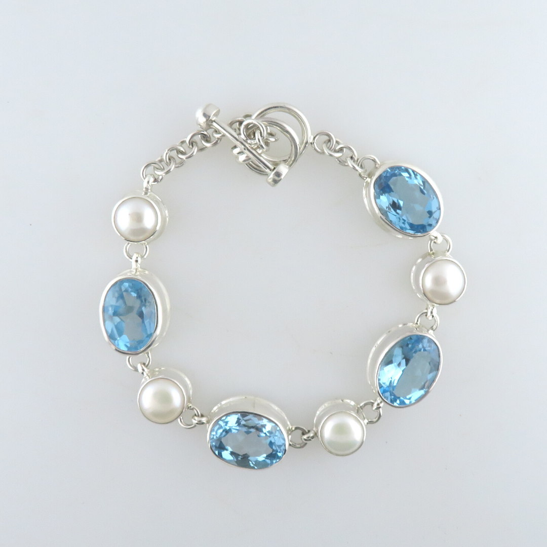 Sterling Silver Bracelet with Blue Topaz and Fresh Water Pearl