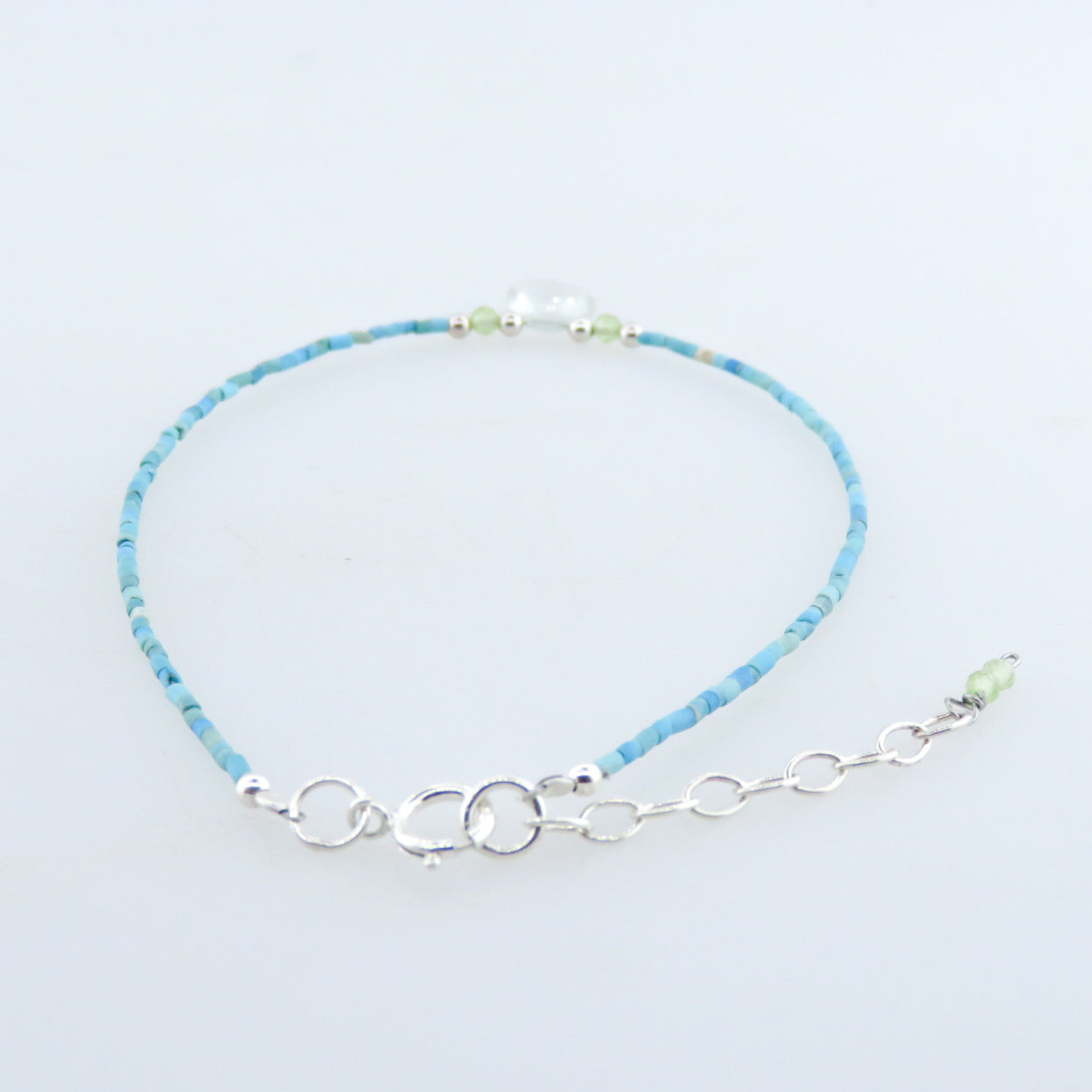 Turquoise Bracelet with  Blue Topaz and Silver Beads