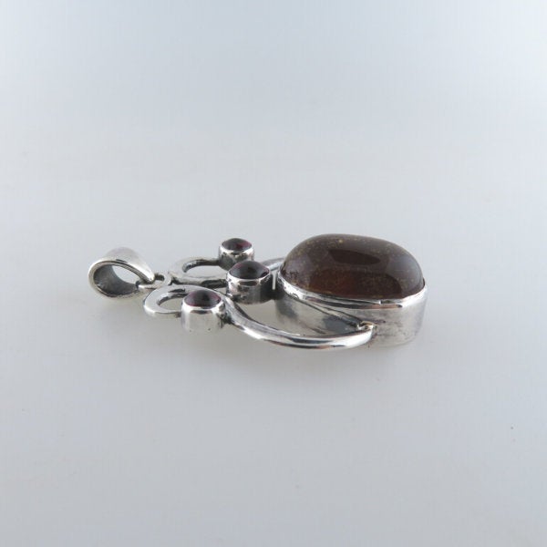 Amber Pendant with Garnet and Sterling Silver