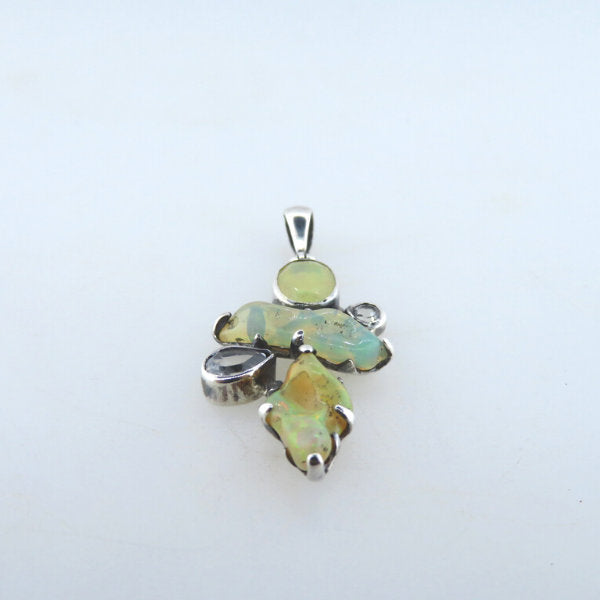 Ethiopian Opal Sterling Silver Pendant with White Topaz