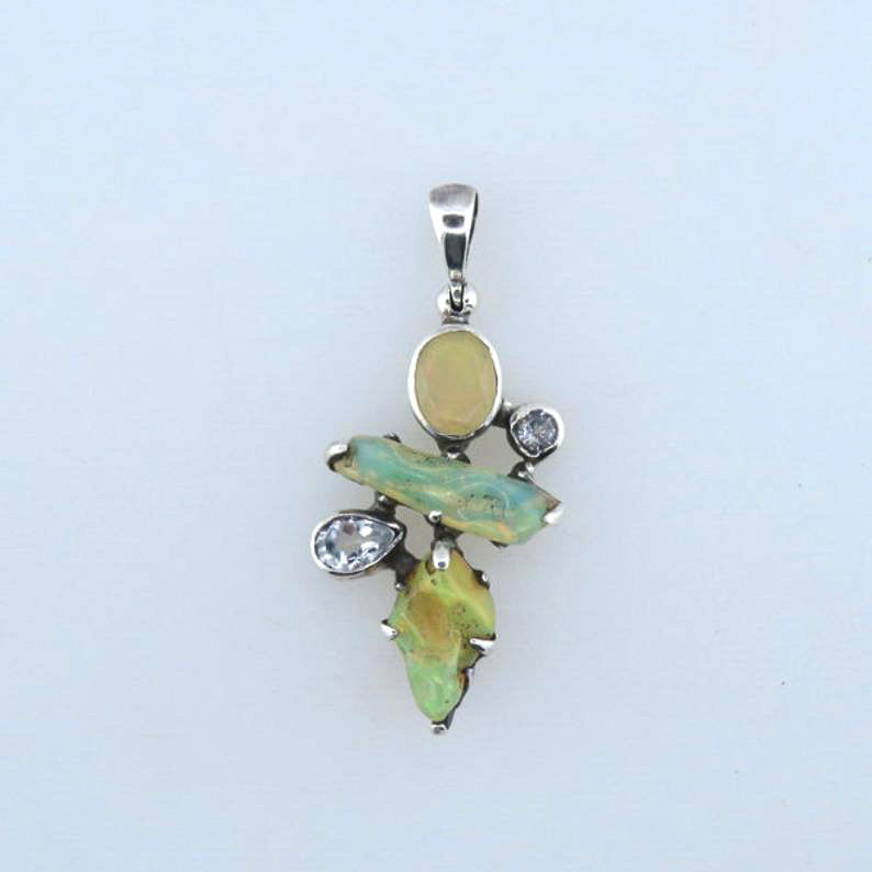 Ethiopian Opal Sterling Silver Pendant with White Topaz