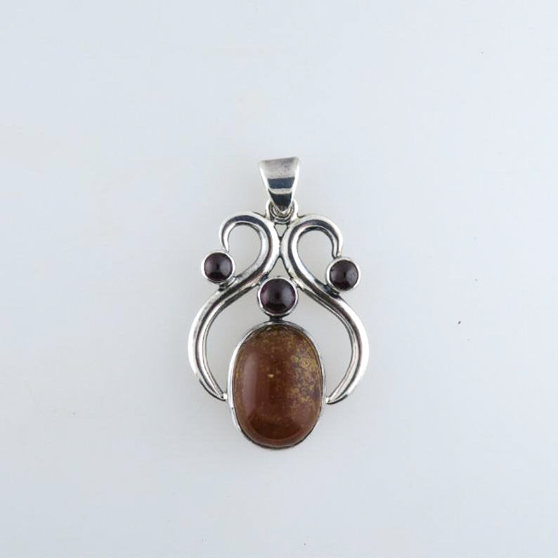 Amber Pendant with Garnet and Sterling Silver